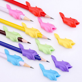 Pequeño delfín de silicona blanda de dibujos animados, dispositivo de escritura y agarre de bolígrafo para niños, dispositivo de corrección de bolígrafo para estudiantes infantiles